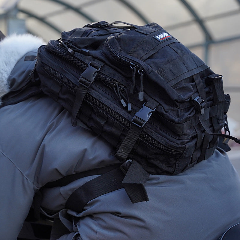 seibertron-gallery:falcon-backpack-20260715 | product:falcon-backpack | color:Black | slot:2 | Seibertron Falcon backpack black 37L motorcycle riding backpack scene